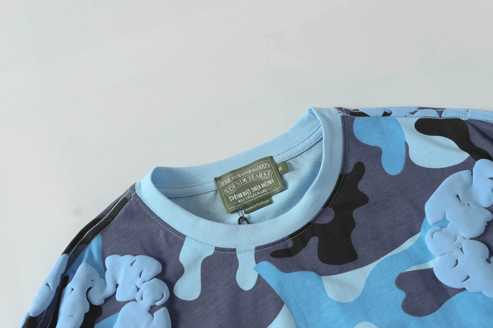 208# DENIM TEARS Kapok European and American trendy brand high quality foam flocking camouflage printed short-sleeved suit Color Camouflage blue Camouflage powder Camouflage gray Camouflage apricot Camouflage green Size S-XL